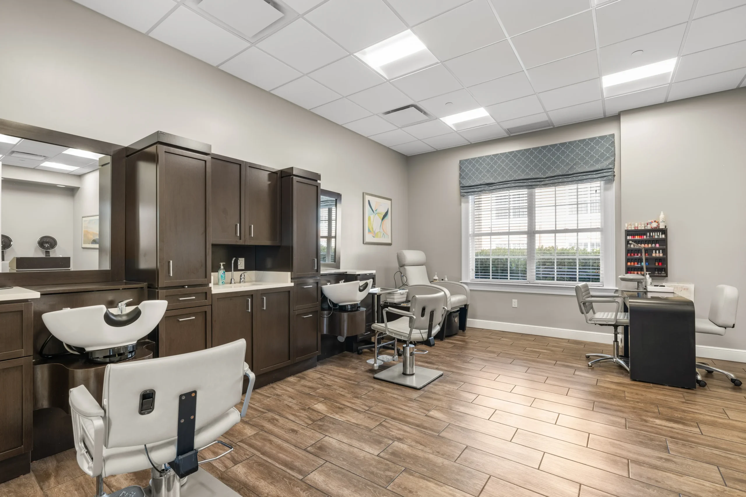 Interior view of a beauty salon with styling stations