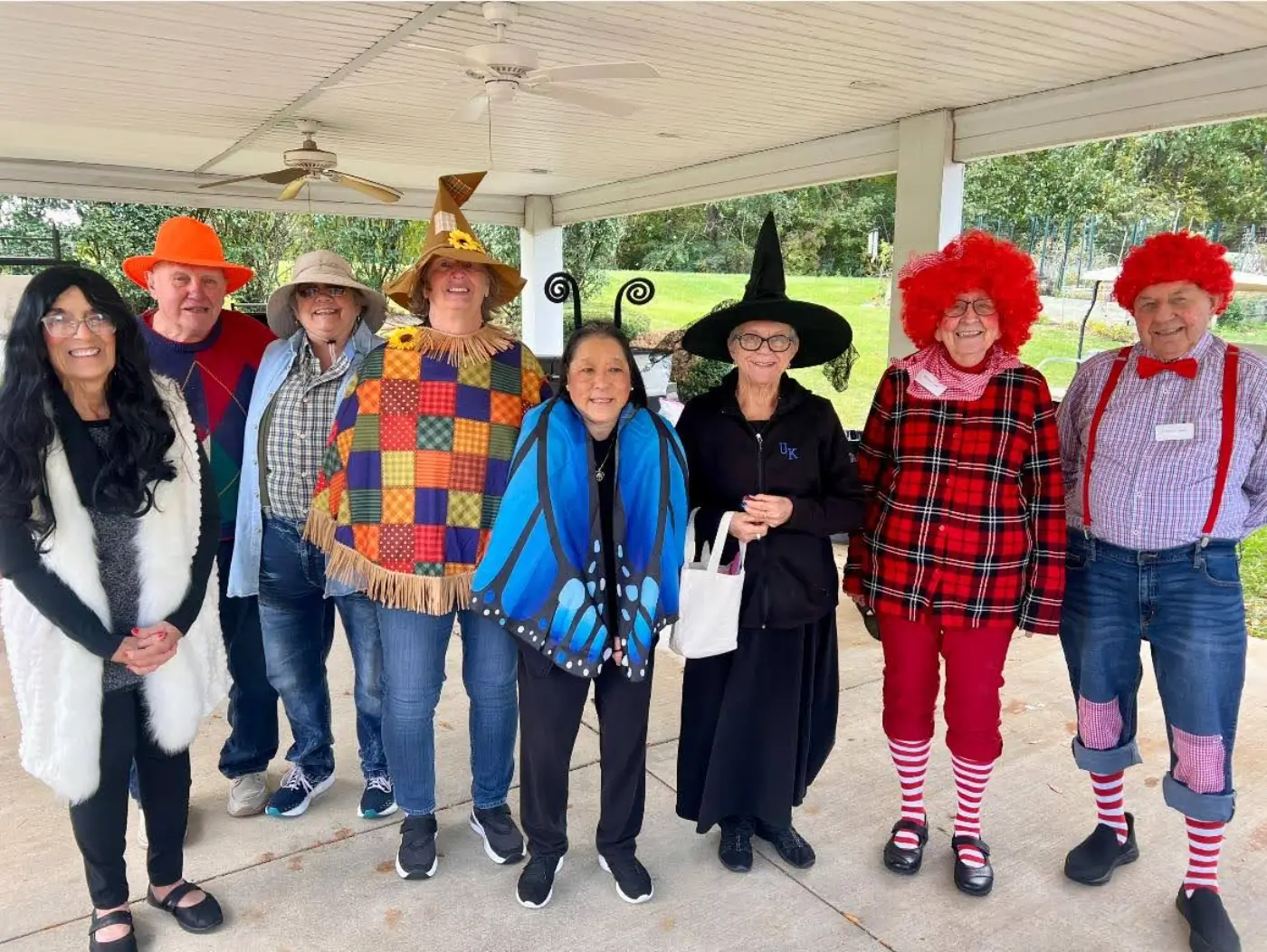 Residents and staff dressed in costumes outdoors