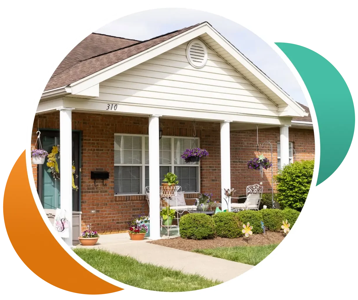 Exterior view of a residential unit with porch and flowers