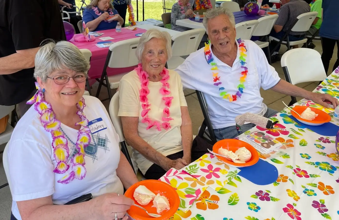 Residents enjoying ice cream at a festive gathering