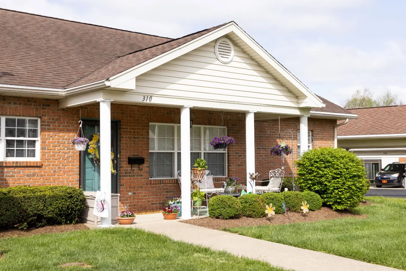Exterior view of a cozy residential building with porch