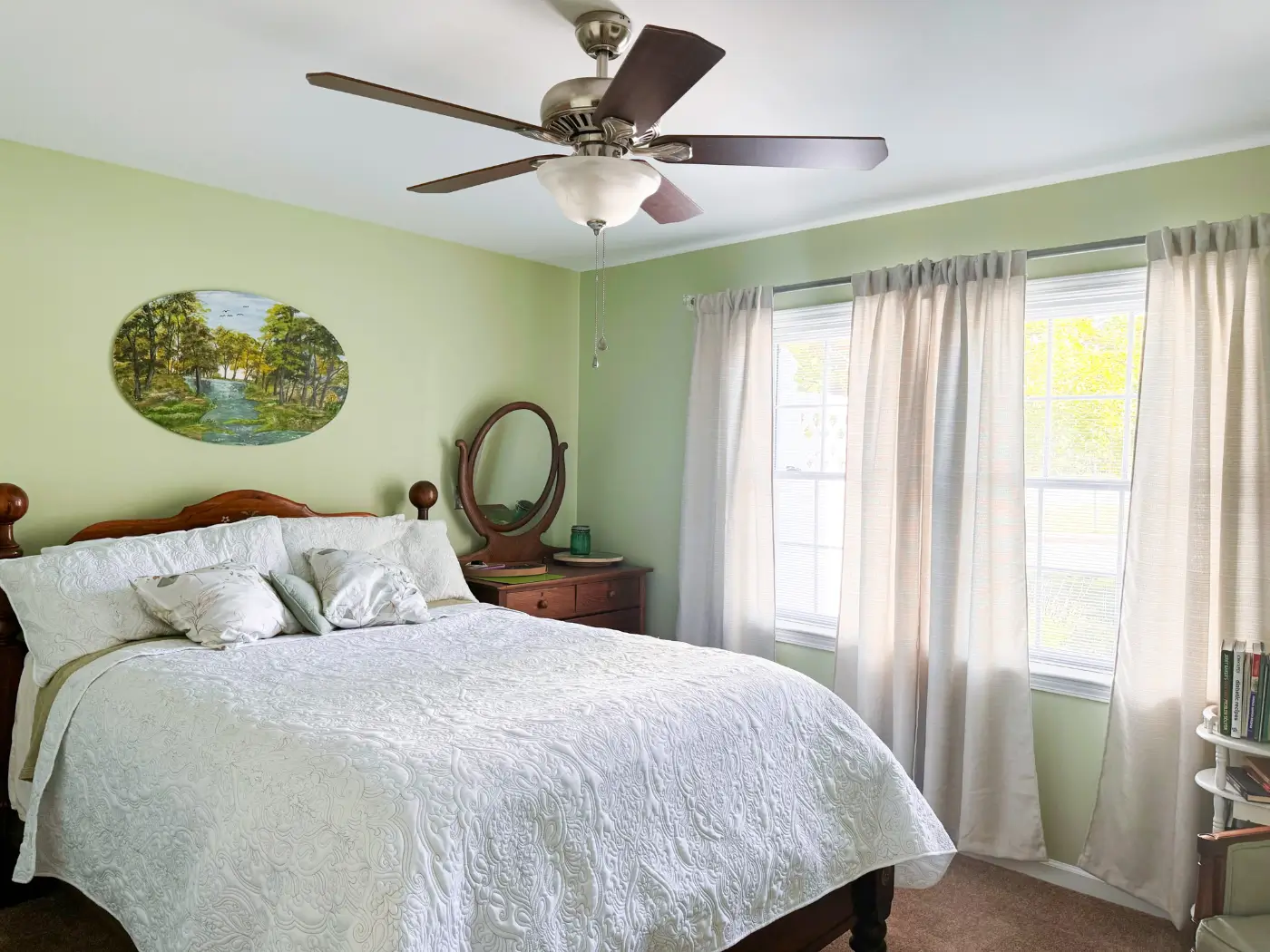 Bright and cozy bedroom with a large window