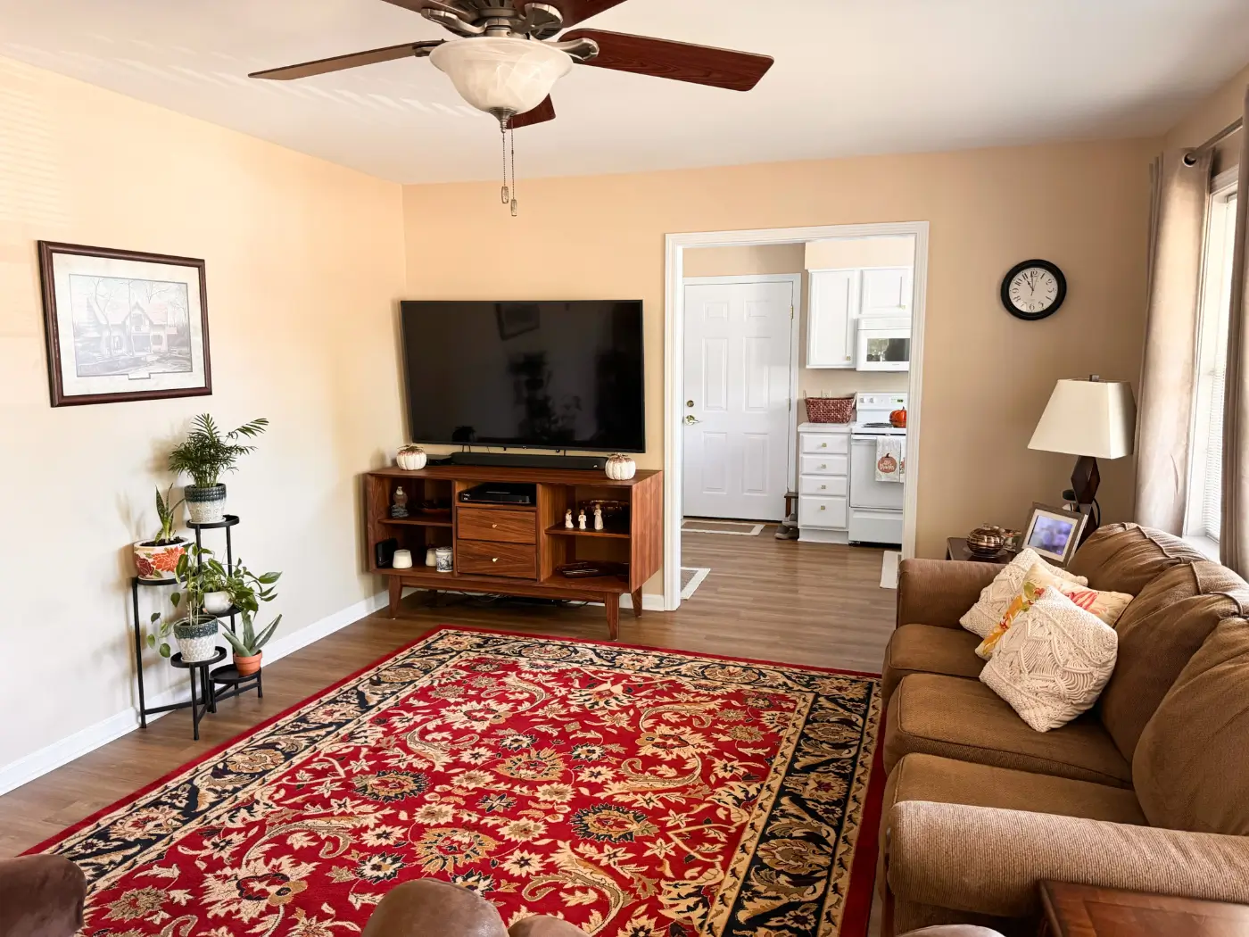 Cozy living room with a couch and TV.