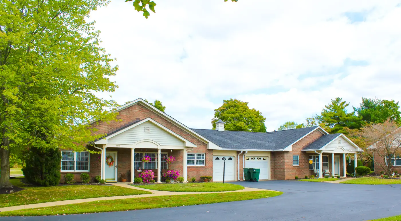 Exterior view of the facility with gardens and walkways