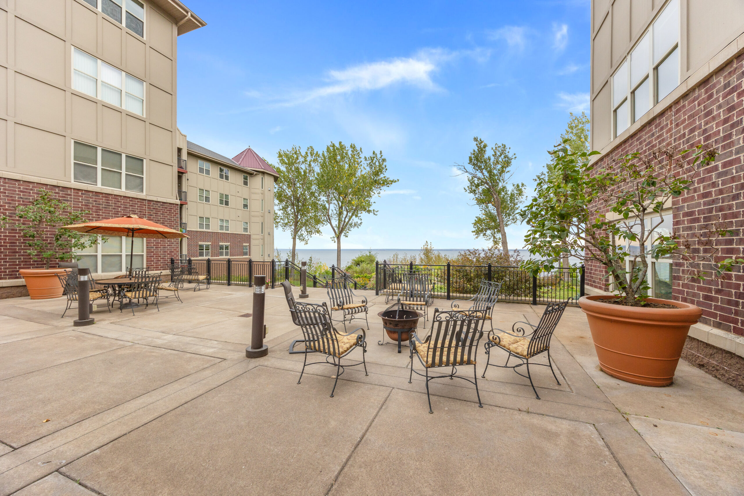 Outdoor patio area with seating and view