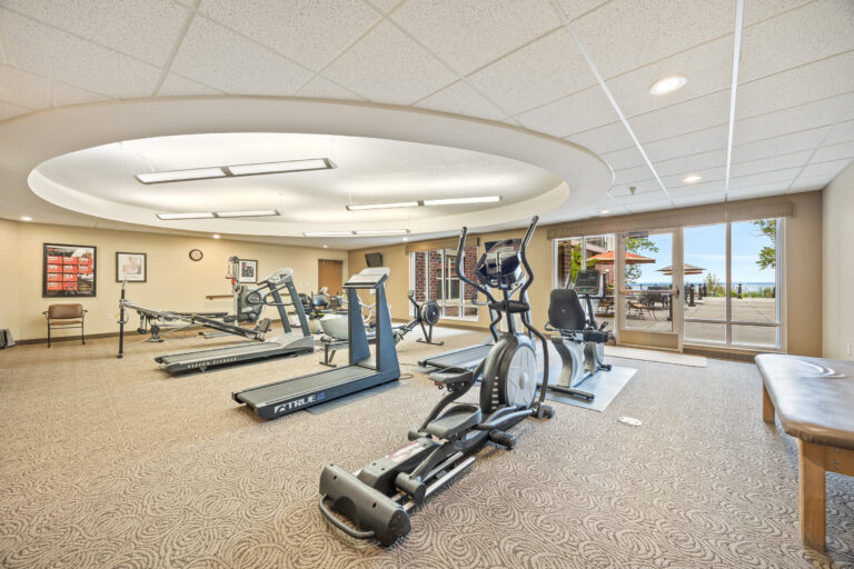 Well-equipped fitness room in a senior living facility