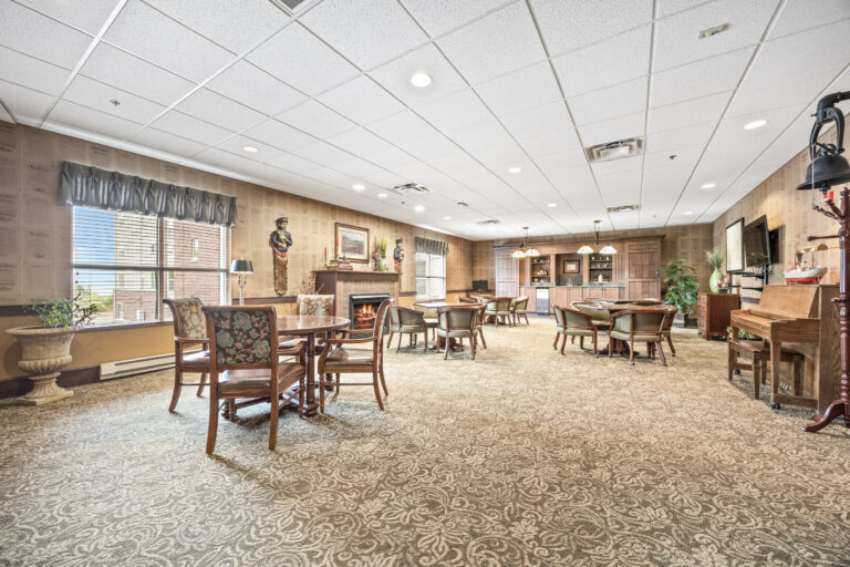Interior view of a common area with seating and fireplace
