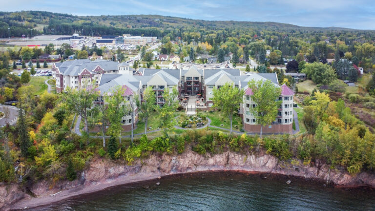 Aerial view of Lakeshore nursing home surrounded by trees