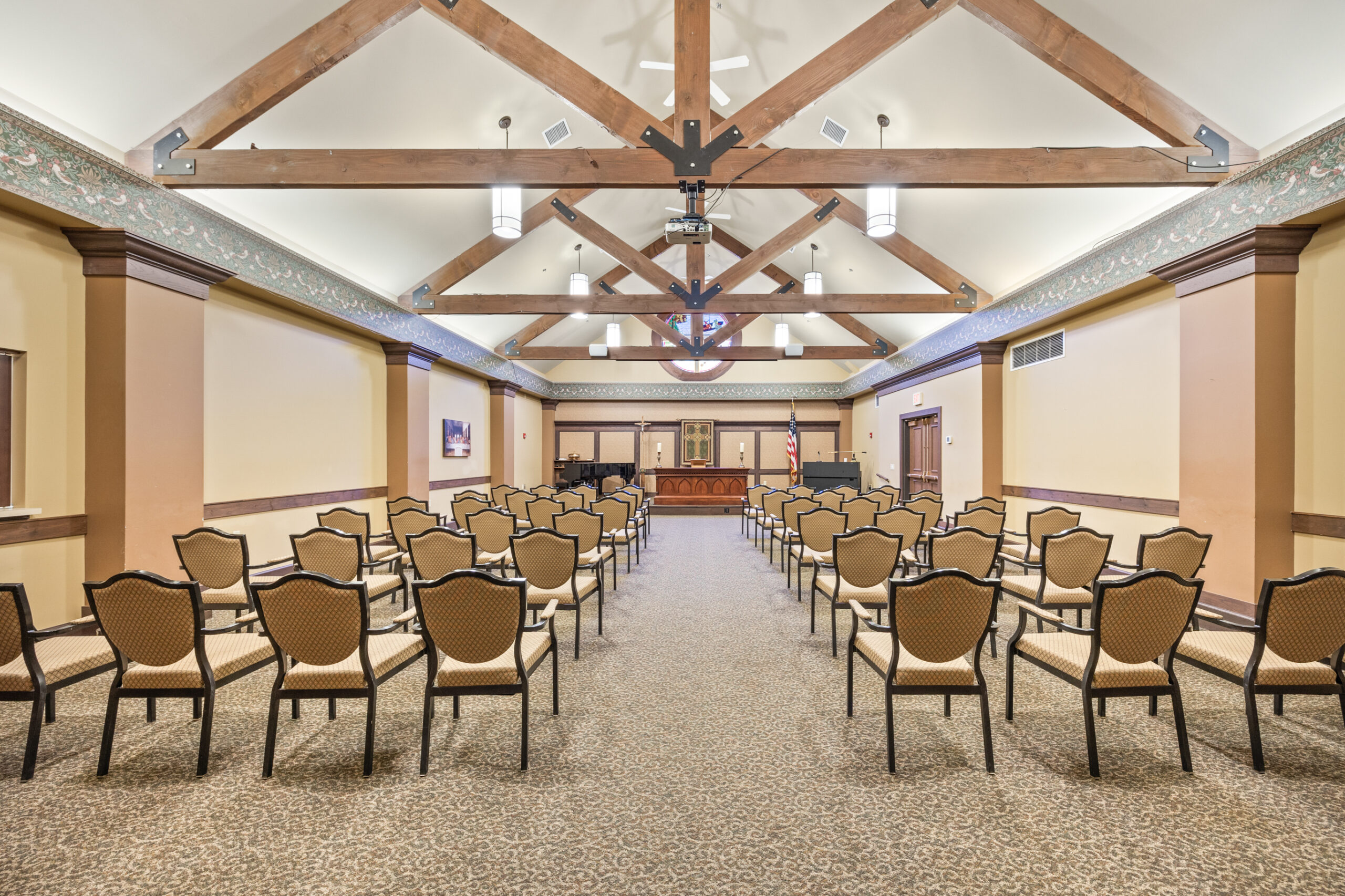Interior view of a spacious activity room with seating