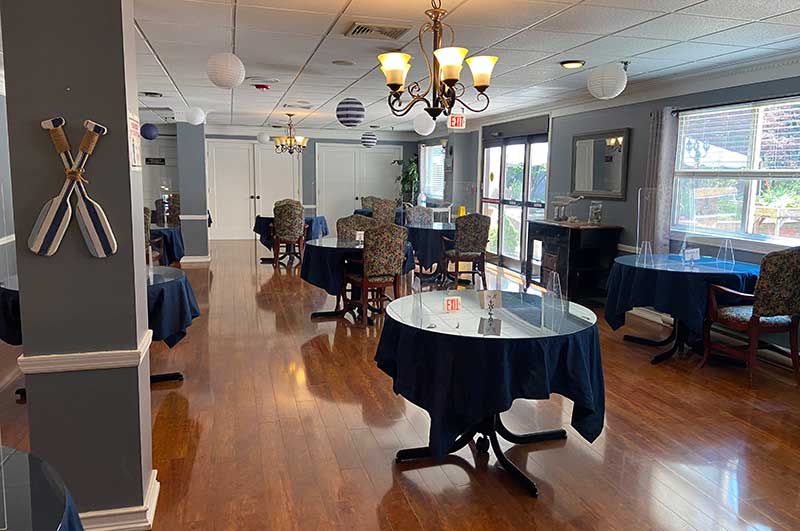 Dining area with round tables and elegant decor