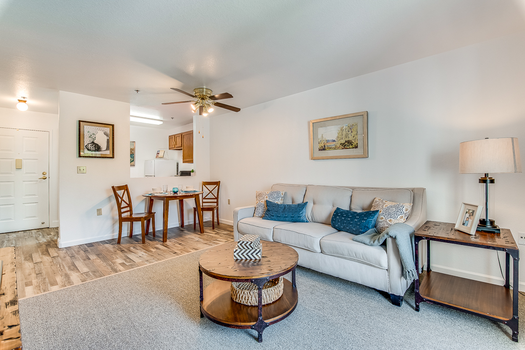 A cozy interior view of a resident room with light decor