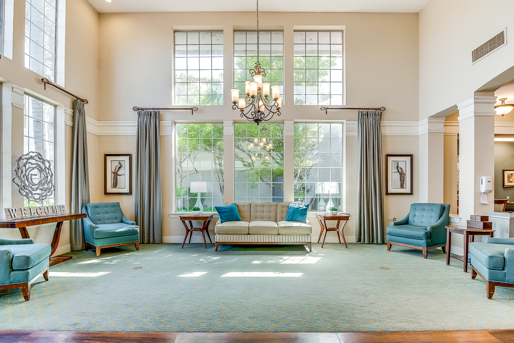 Bright common area with seating and natural light