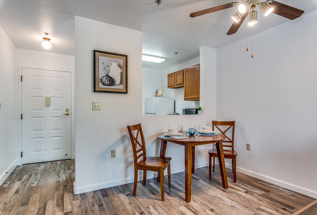 Cozy dining area setup in a resident's unit
