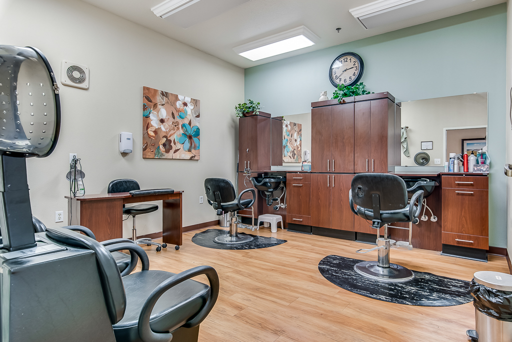 Hair salon interior with styling chairs and mirrors