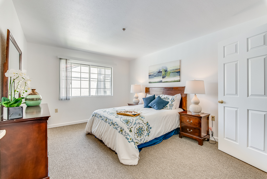 Cozy private room with a bed and art decor