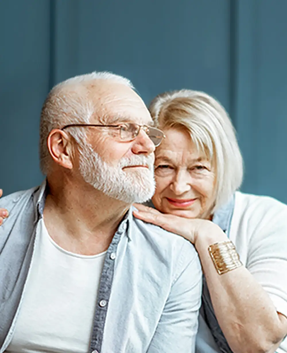 Happy elderly couple smiling together