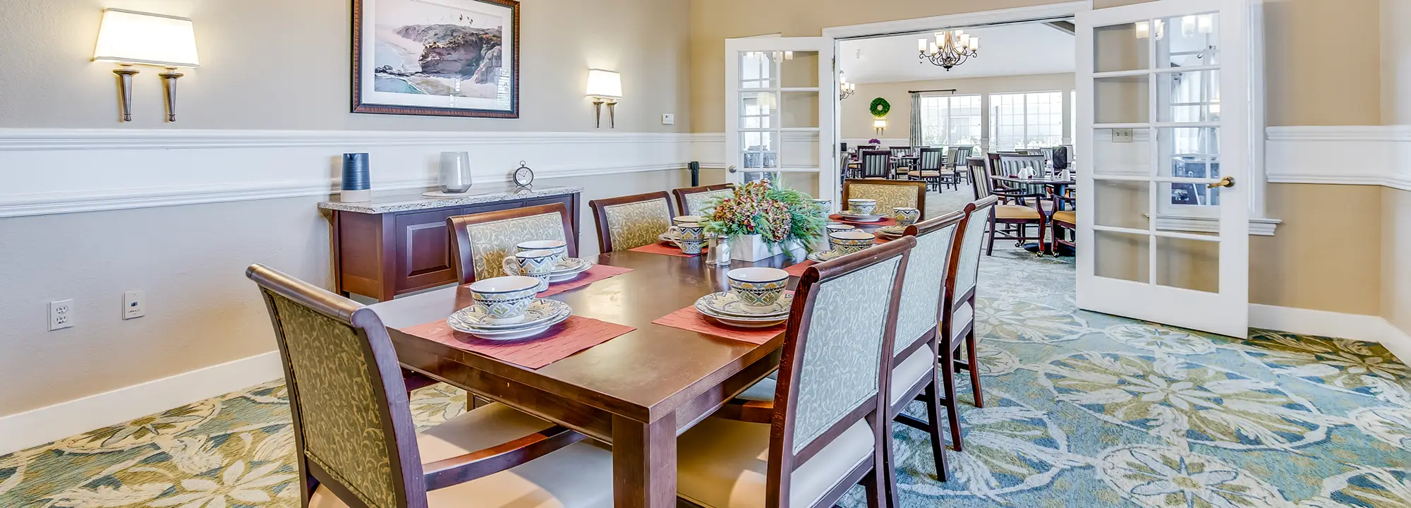 Dining room setting with a table set for a meal
