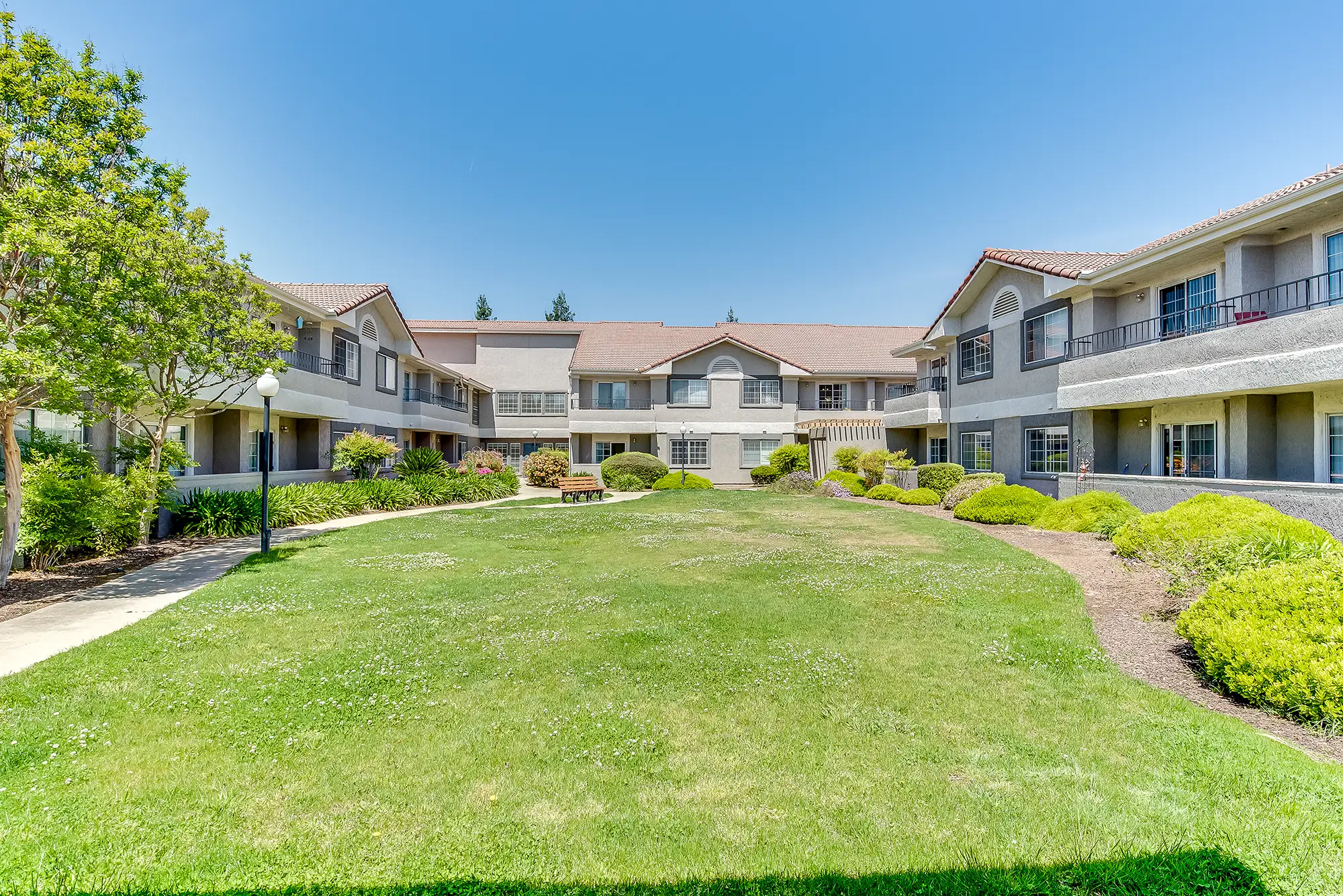 Well-maintained outdoor space with gardens