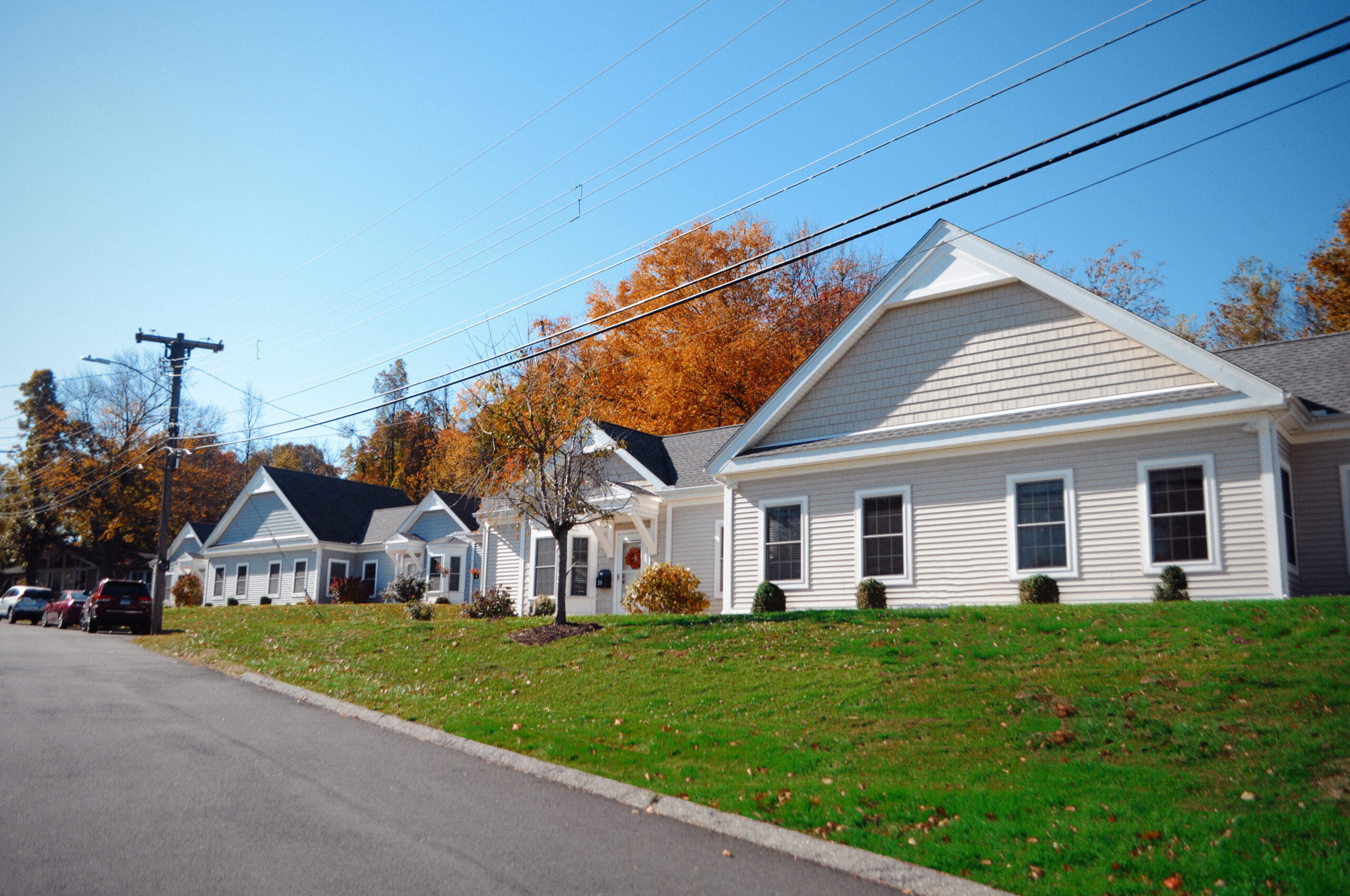 Exterior view of a senior living facility on a sunny day
