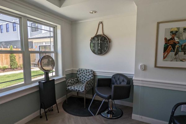 Cozy corner with chairs and wall clock