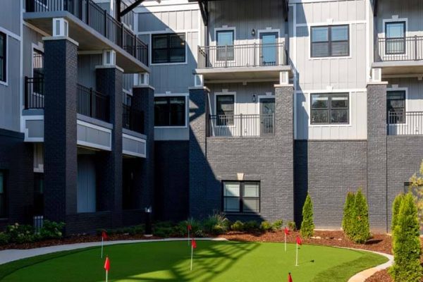 Outdoor green space with mini-golf and balconies