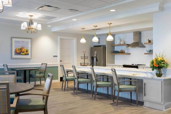 Bright dining area with tables and chairs