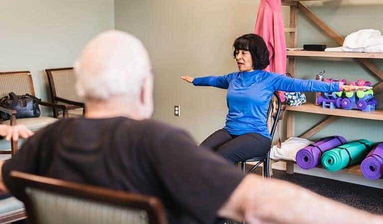 Residents participating in a gentle exercise class