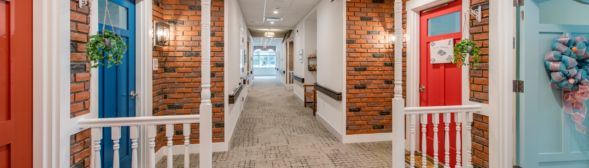 Bright interior hallway with colorful doors