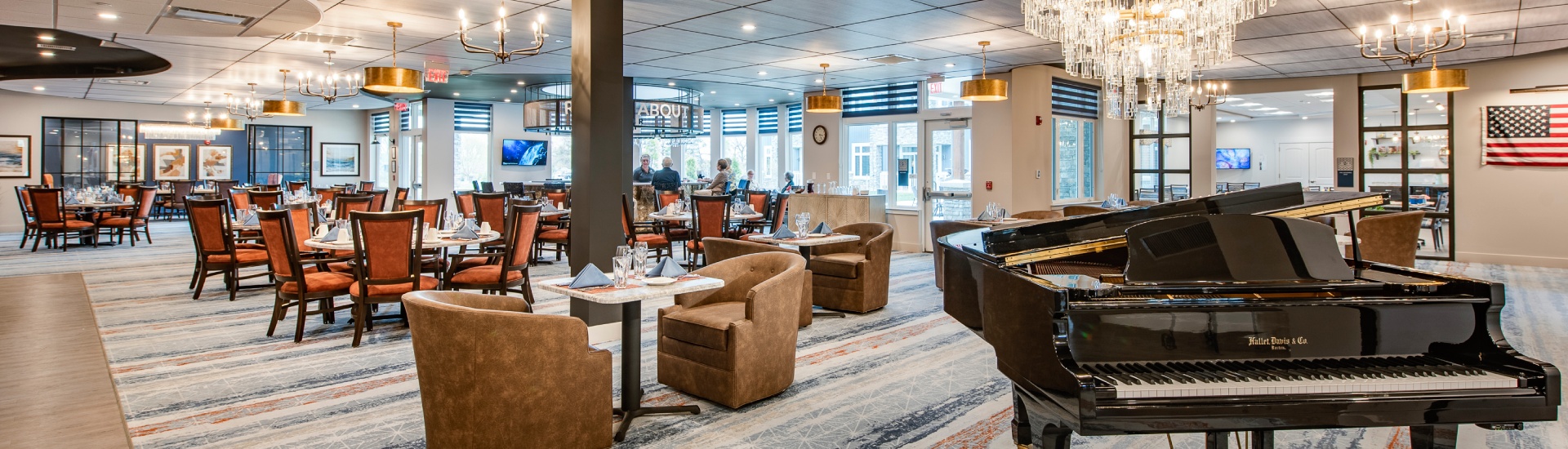 Elegant dining room with residents enjoying meals
