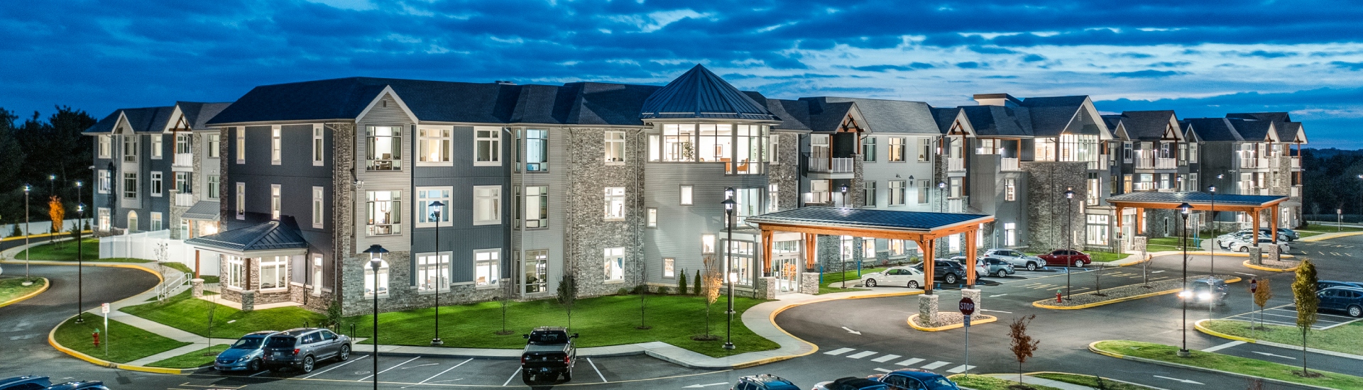 Aerial view of the facility entrance at dusk