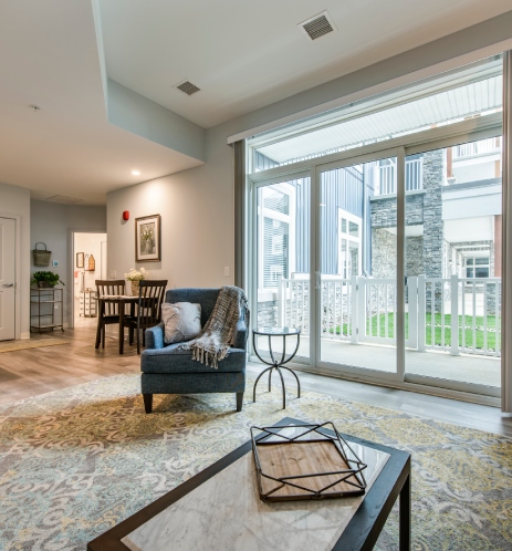 Bright interior living space with access to outdoor area