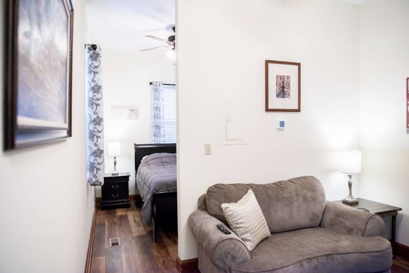 Cozy resident room with bed and seating