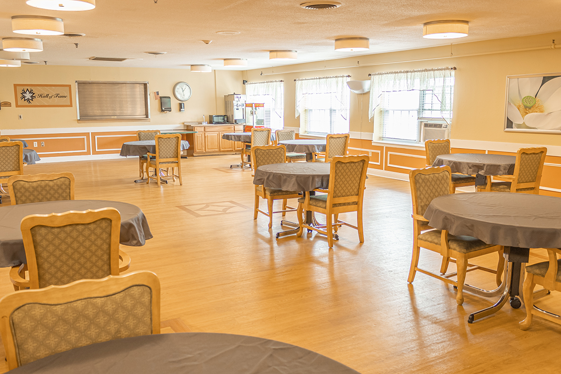 Interior view of a clean dining room with tables