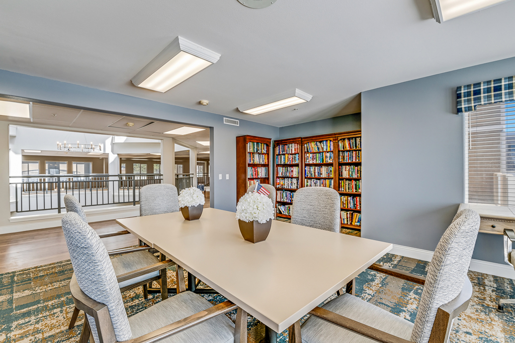 Bright common area with books and tables