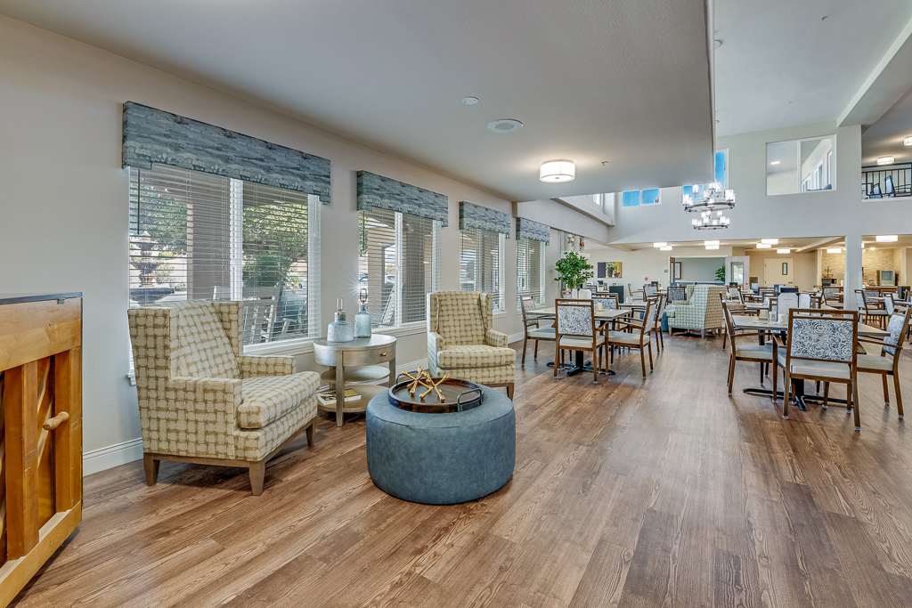 Dining area with seating and natural light