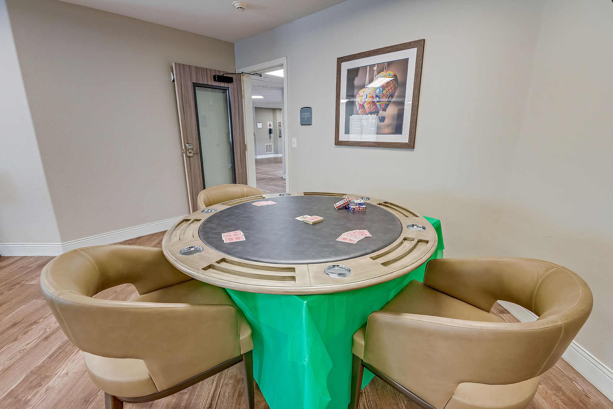 Card game table in a recreational room.