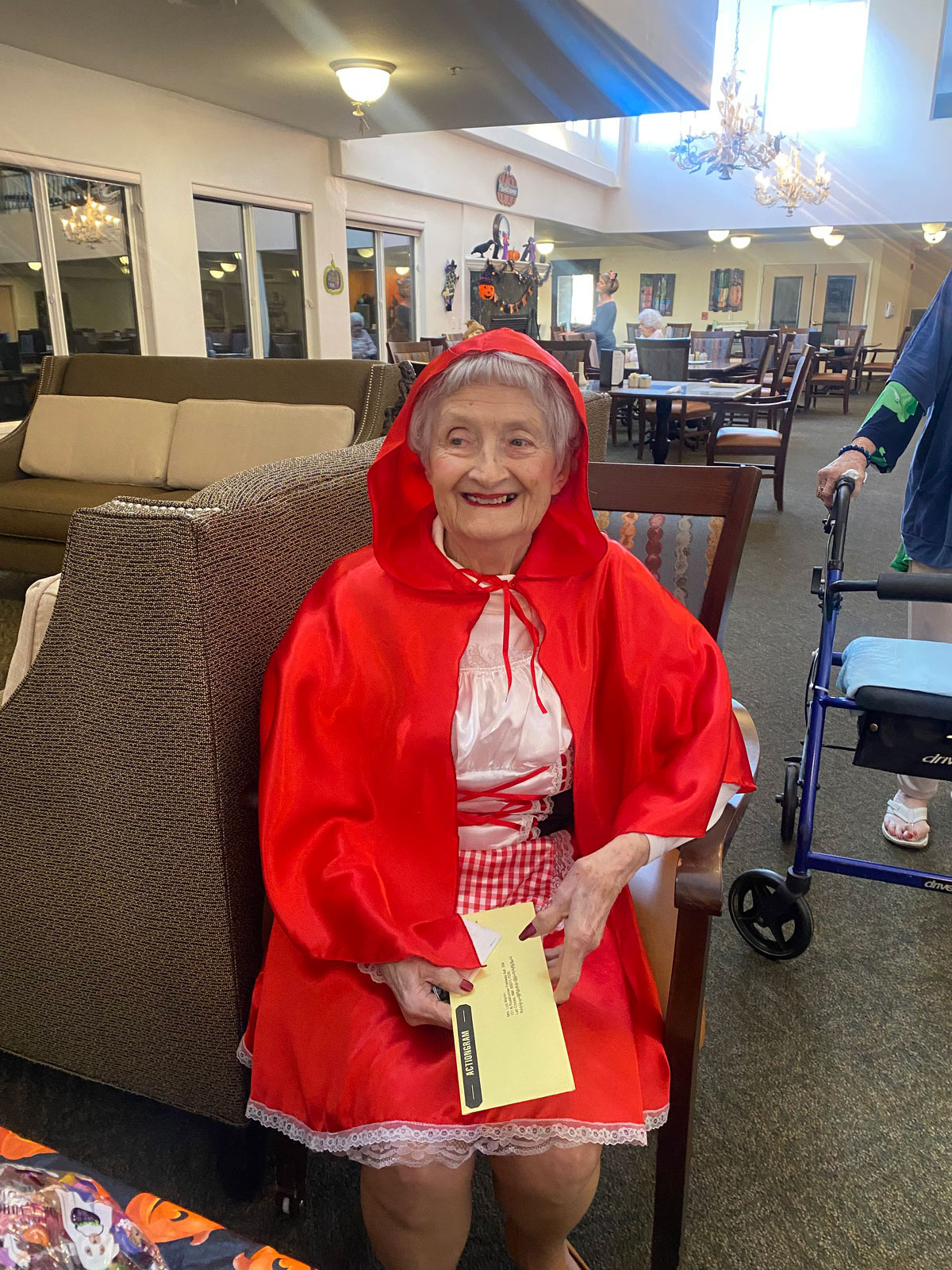 Resident celebrating in a festive costume.