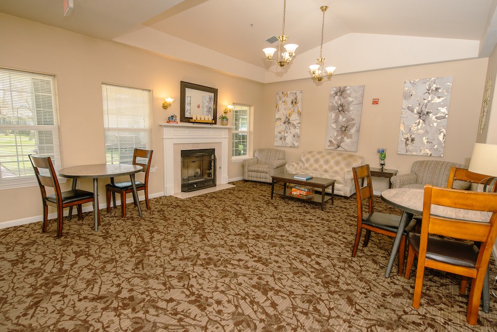 Cozy common area with seating and fireplace.