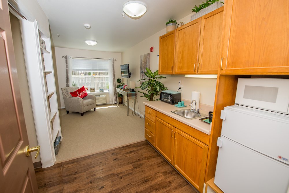 Cozy assisted living kitchen area with amenities