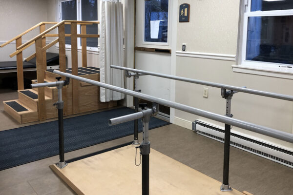 Physical therapy equipment in a rehabilitation space.