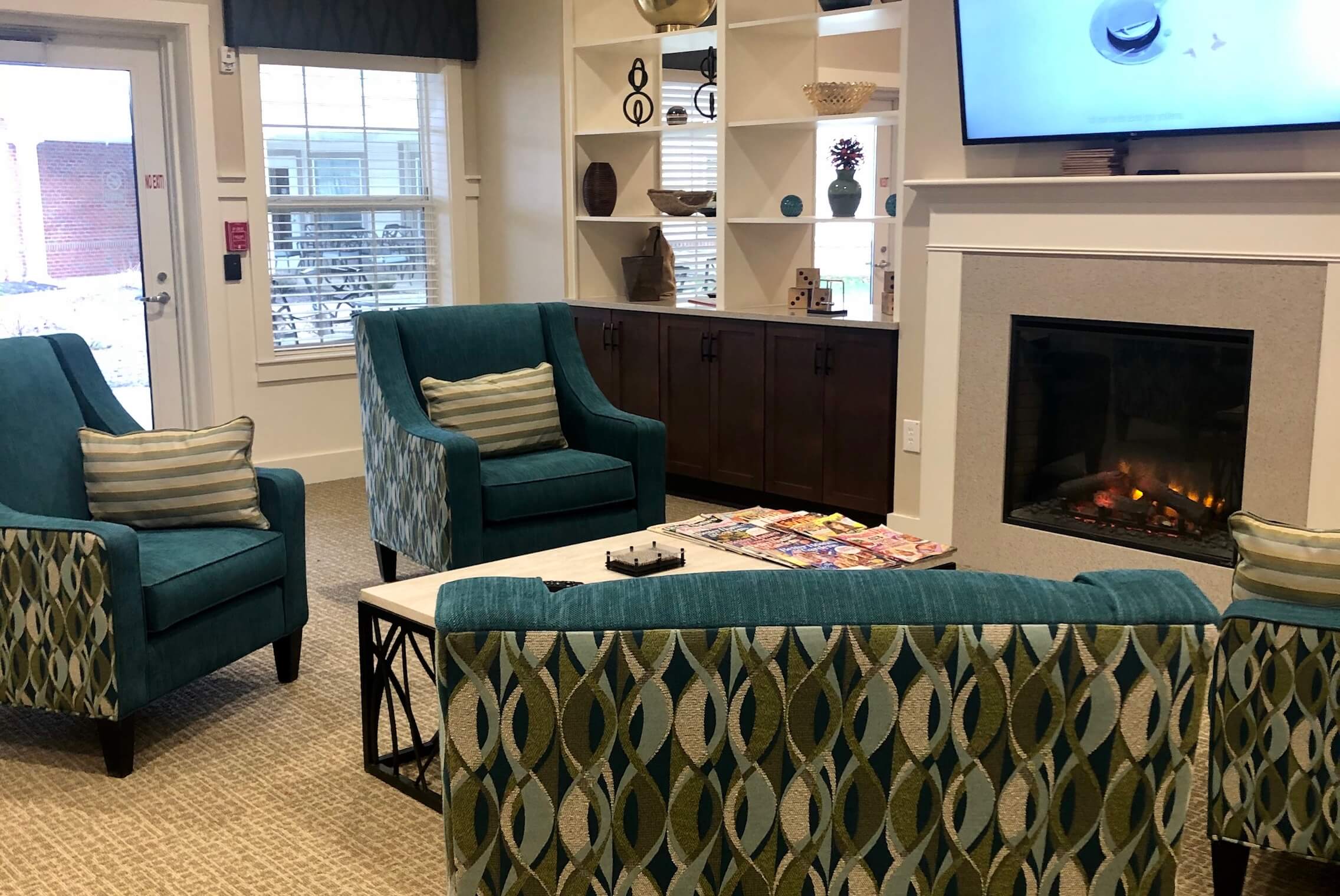 Comfortable seating area with fireplace.