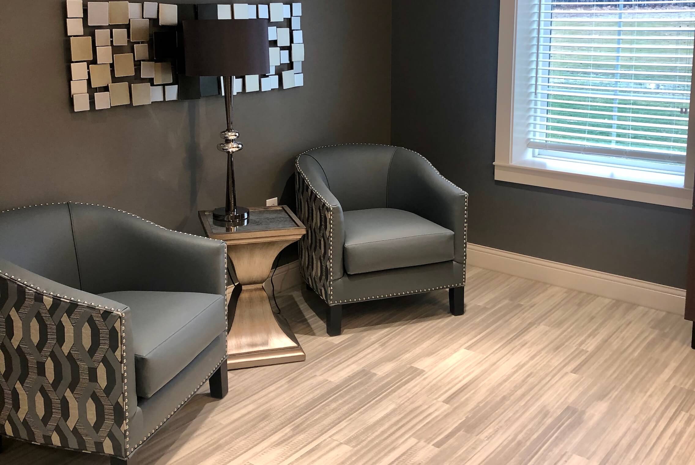 Seating area with comfortable chairs and lamp