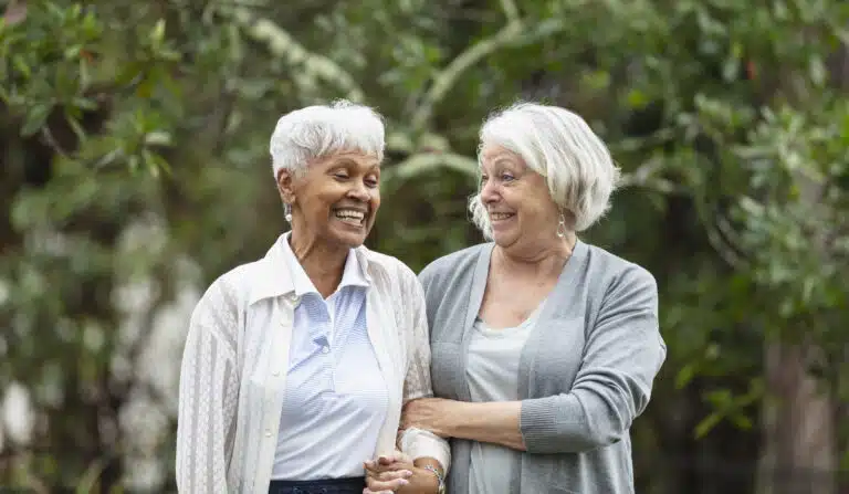 Two women enjoying time together outdoors.