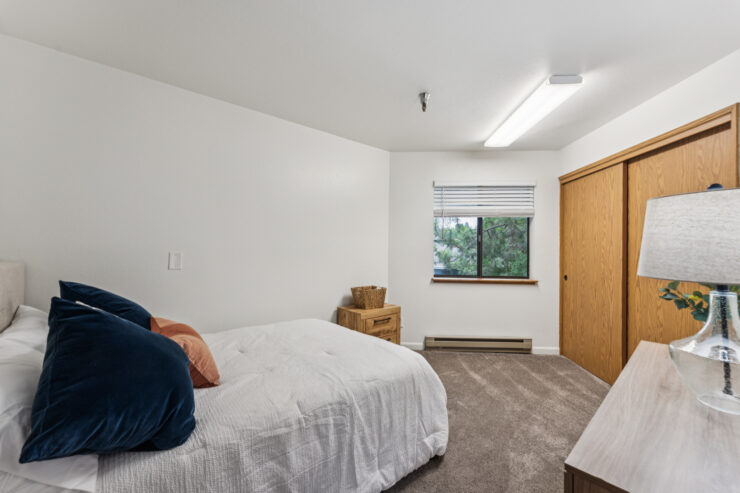 Well-furnished resident room with natural light