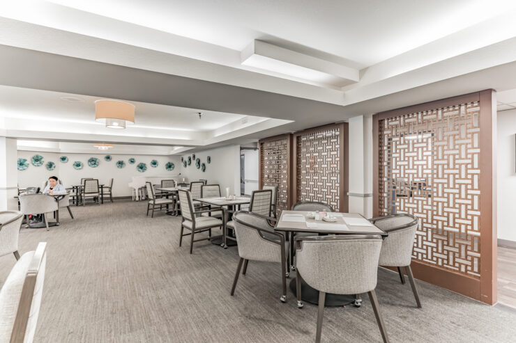 Dining area with residents and decorative elements