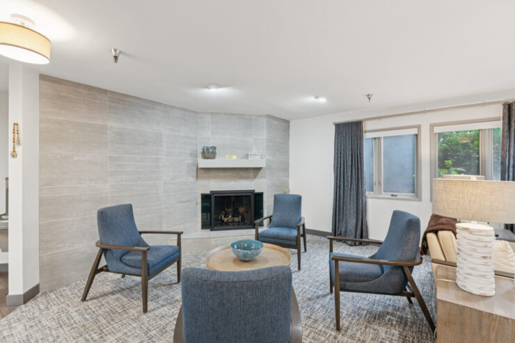 Cozy common area with seating and fireplace