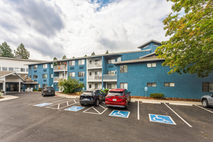 Exterior view of the facility with parking access.