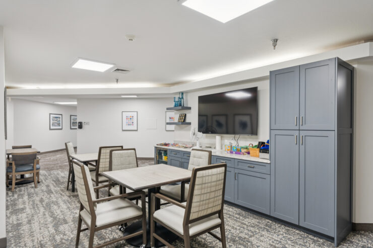 Common area with seating and TV