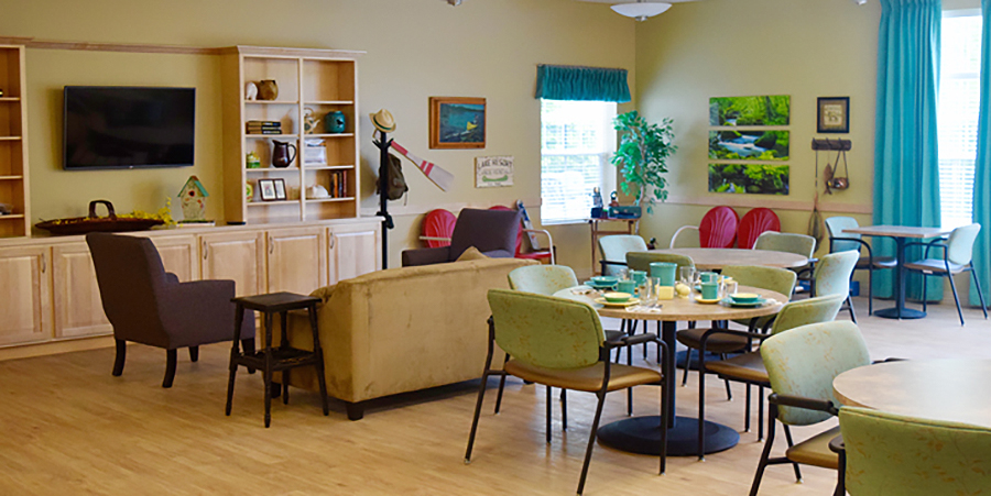 Common area with seating and decor for residents.
