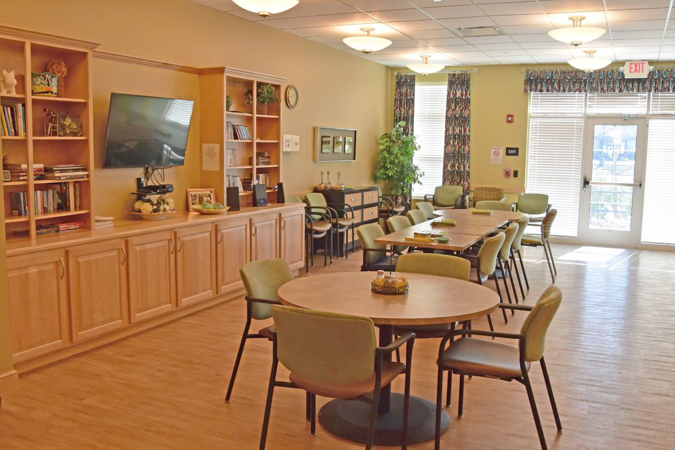Interior common area with tables and seating.
